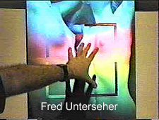 You Tube clip of Fred Unterseher displaying pulsed holograms and rainbow transfers and installations  - West Coast Artists in Light by Al Razutis