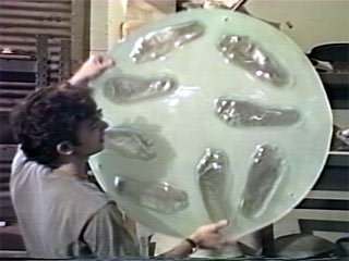 Steve Weinstock with glass form at his studio Alchemy Glass Works Los Angeles