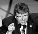 click to enlarge - Michael Moore ranting about a 'fictional Bush' while accepting his Academy Award for 'Bowling at Columbine'